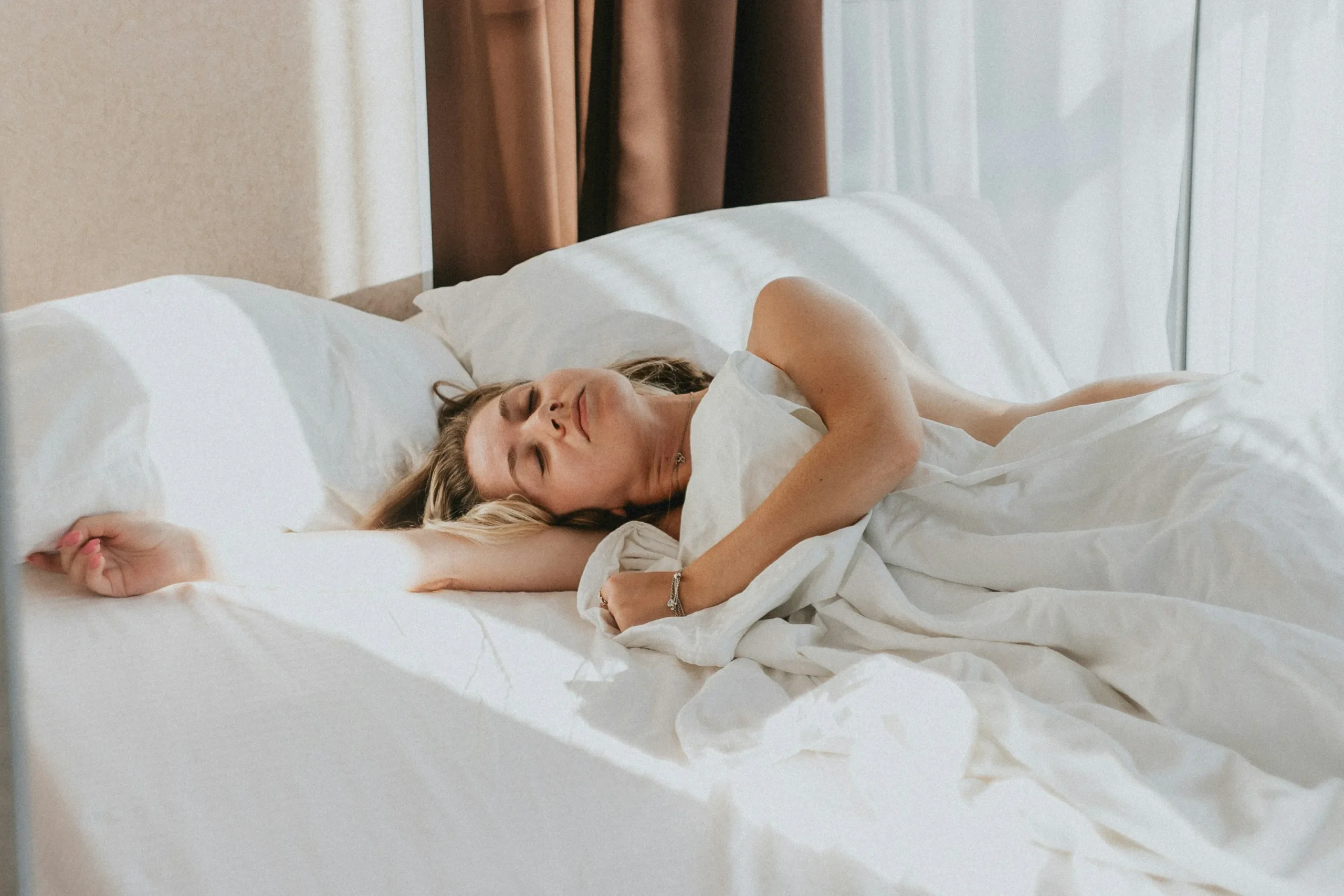 A woman laying in bed