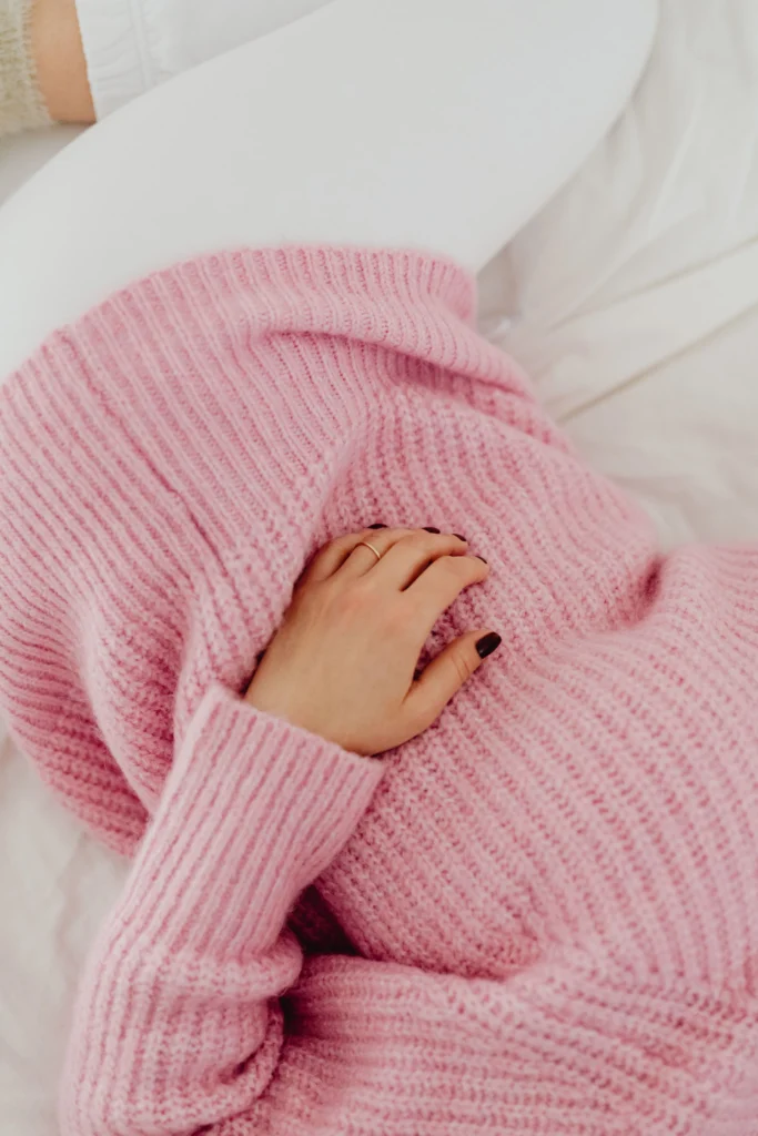 A woman with stomach pain