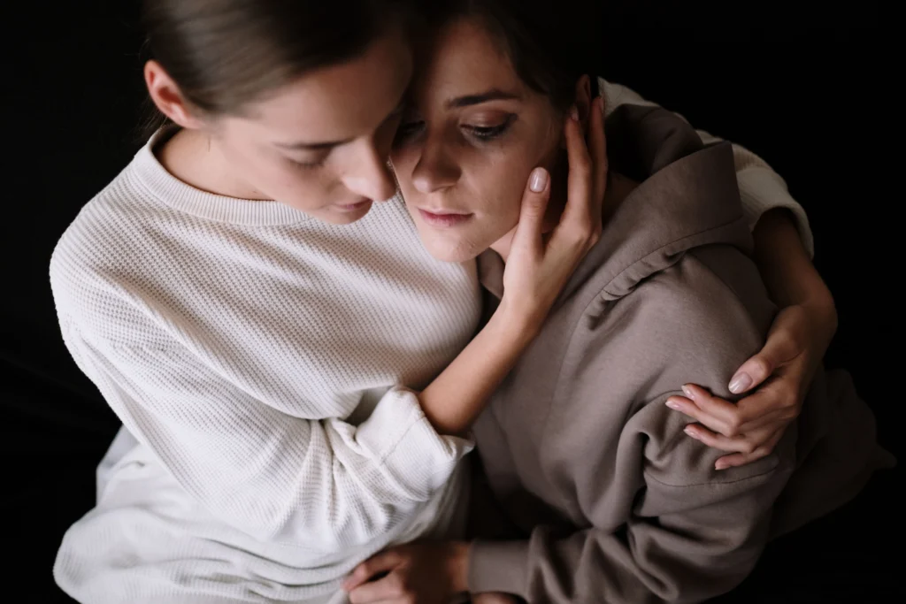 A woman hugging her friend
