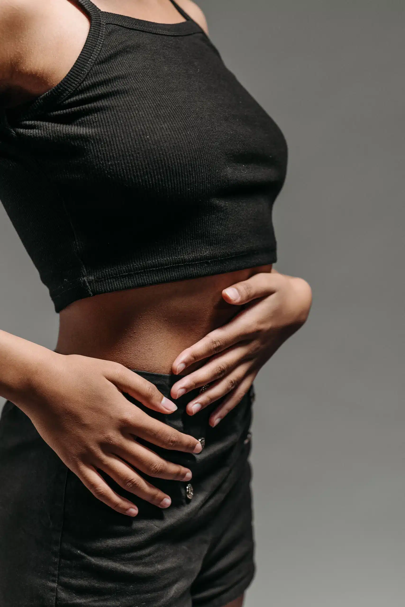 A woman with hands on her waist