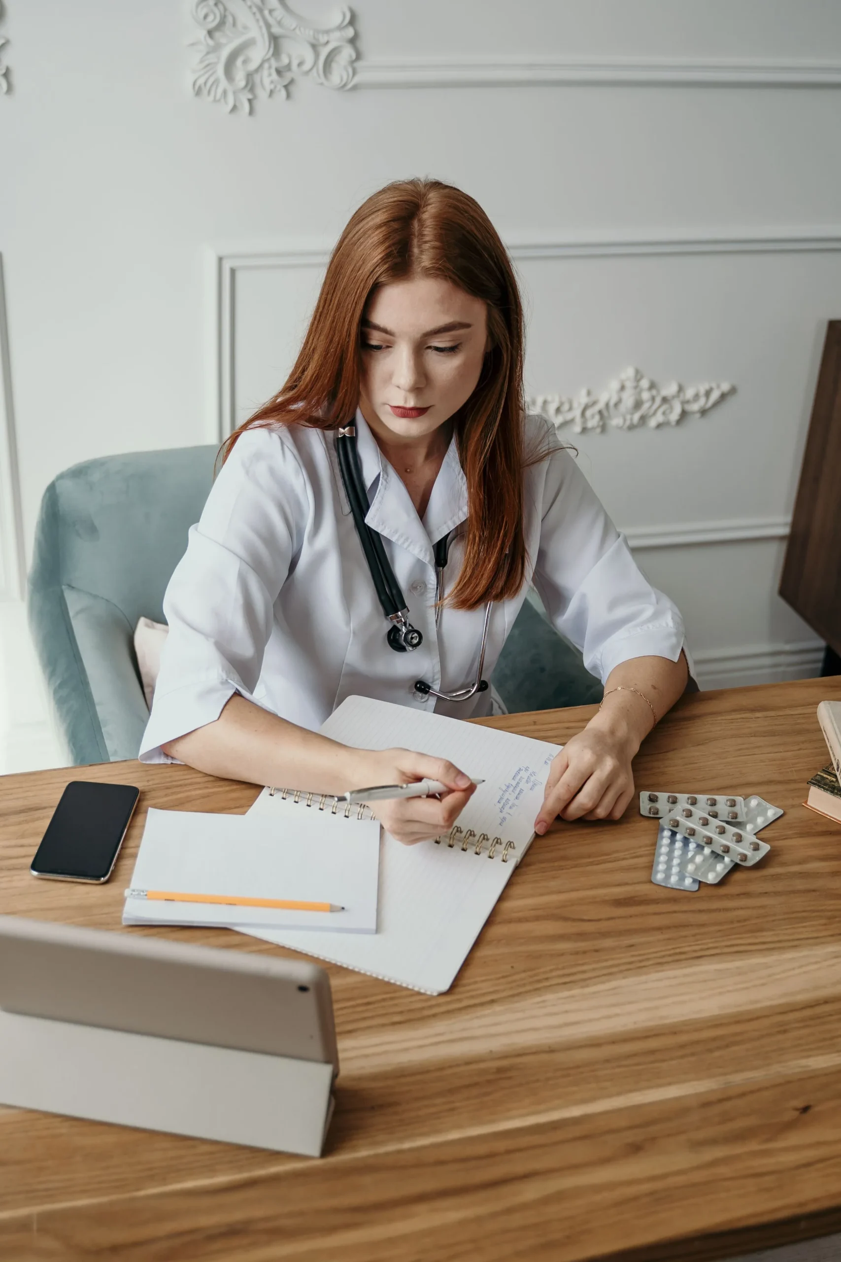 A doctor prescribing medicine
