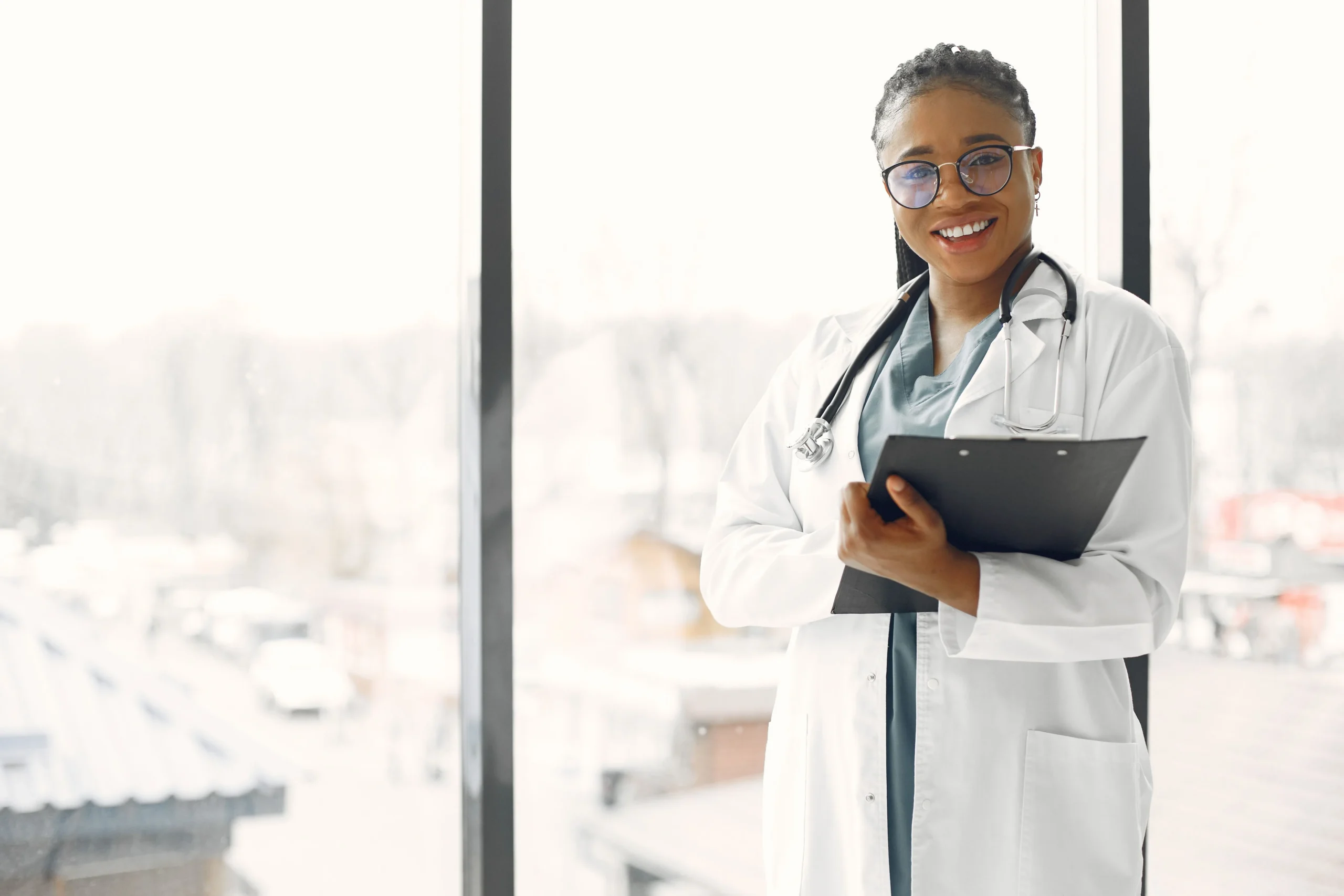 A doctor smiling at the camera