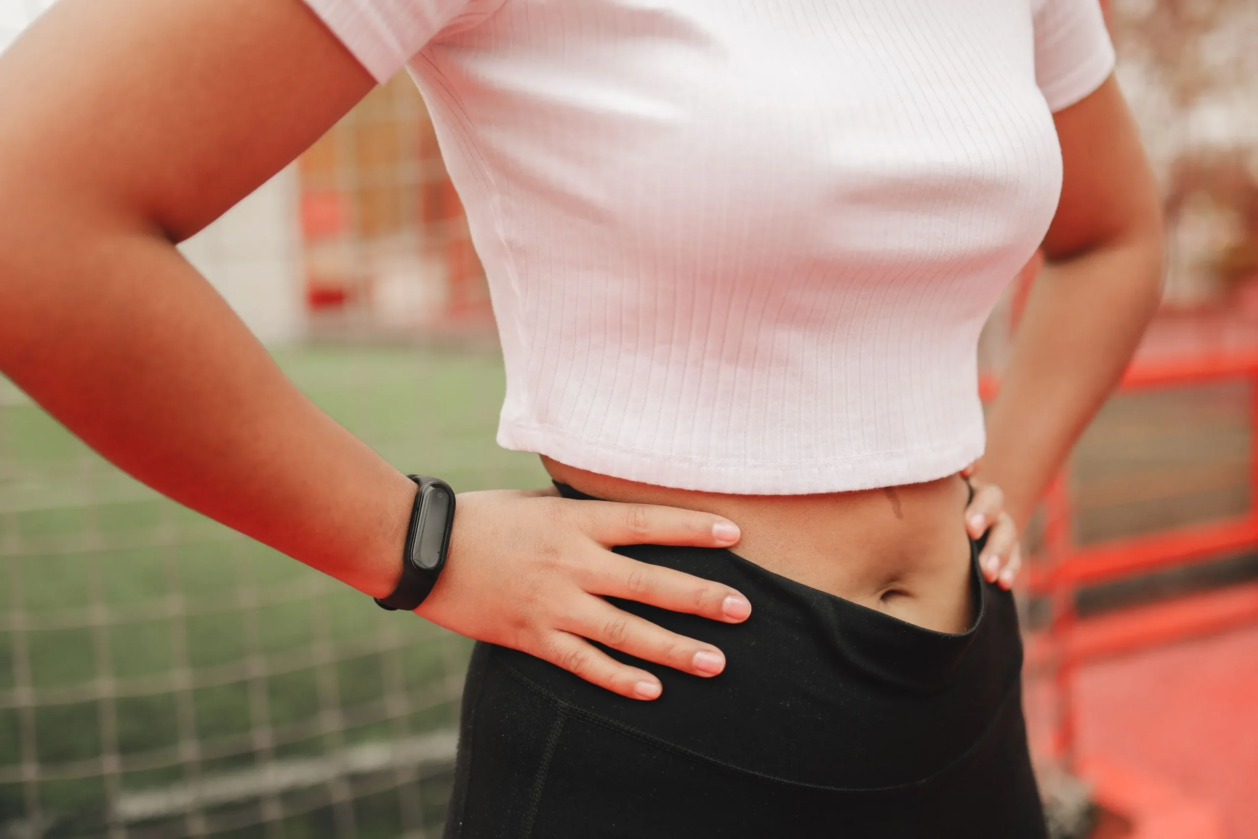 A woman with hands on her waist