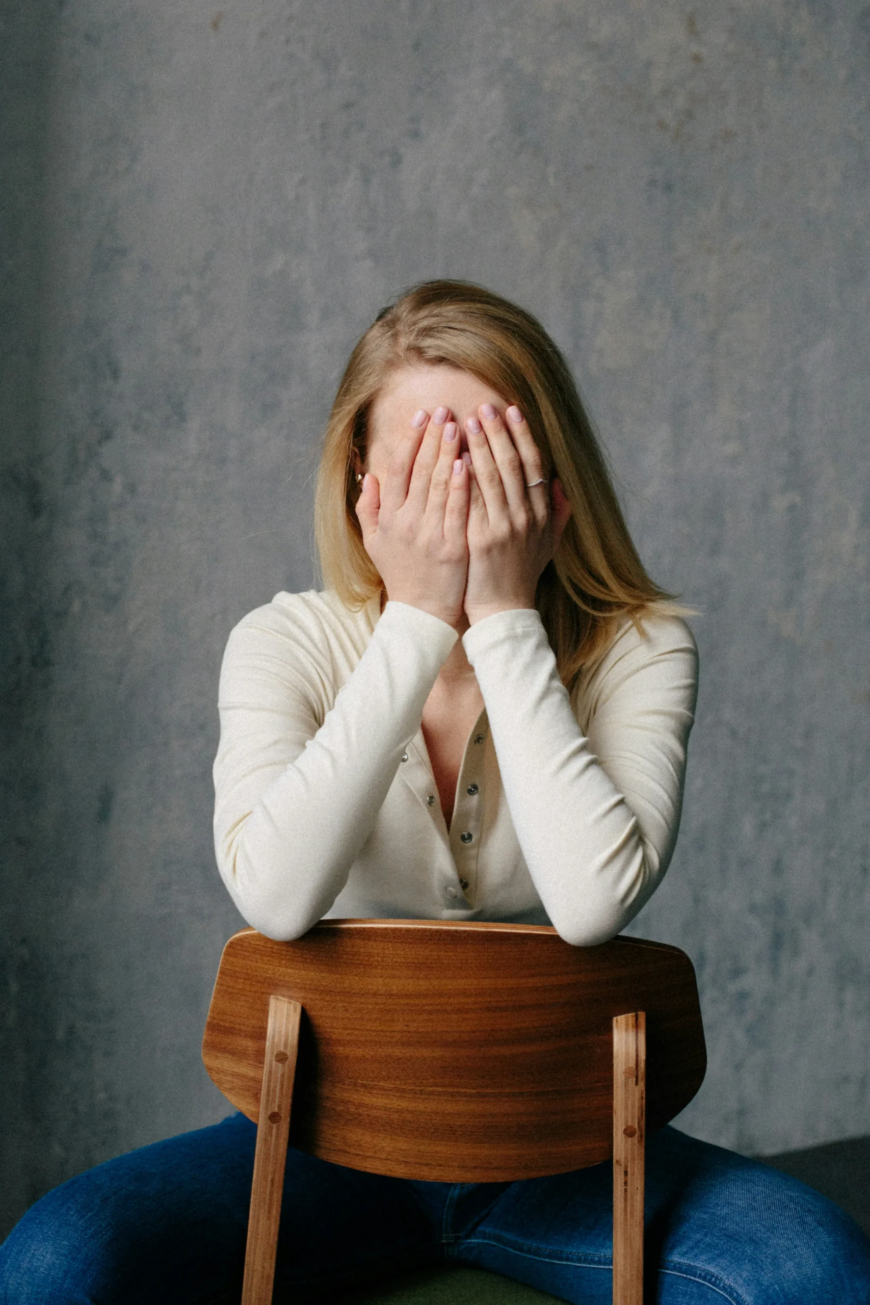 Woman experiencing bowel pain during menstruation