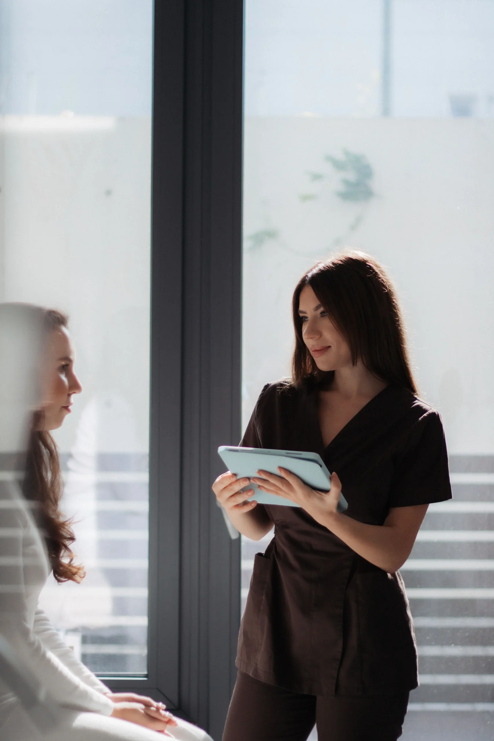 A doctor speaking to a patient for patient history