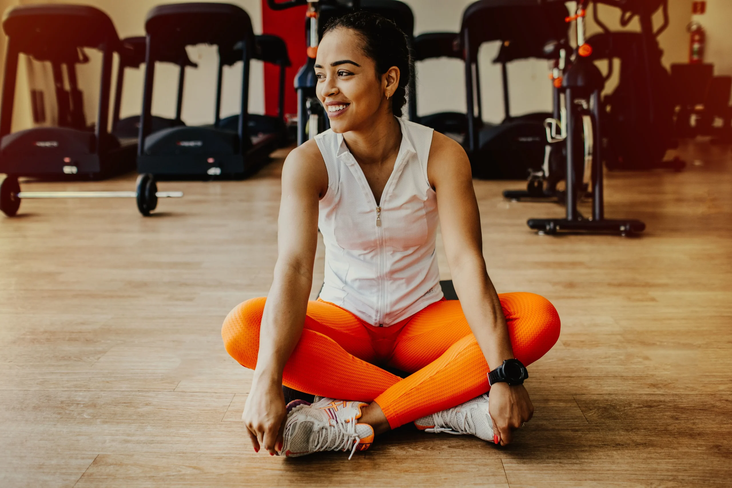 An athletic woman smiling