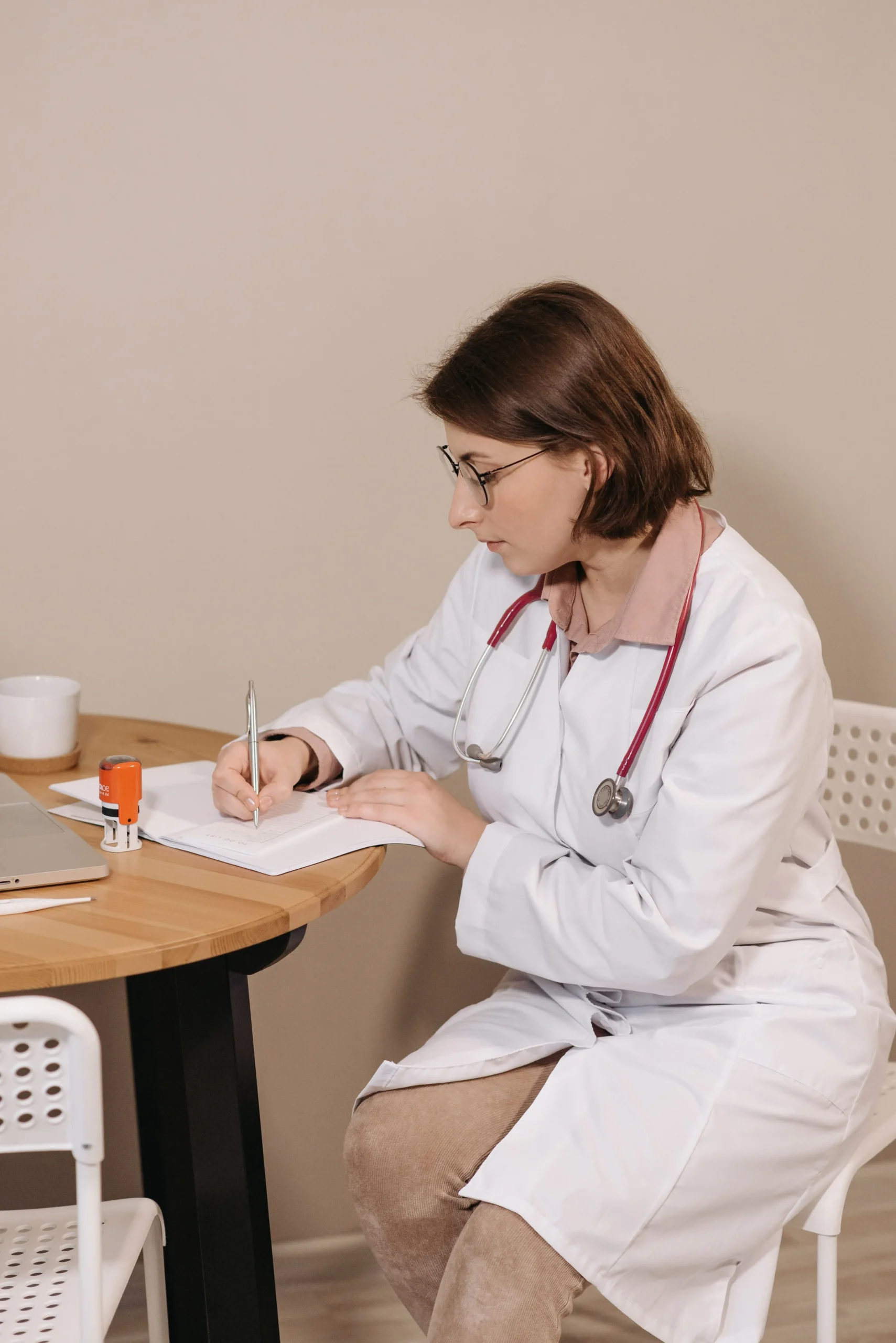 A doctor writing a prescription
