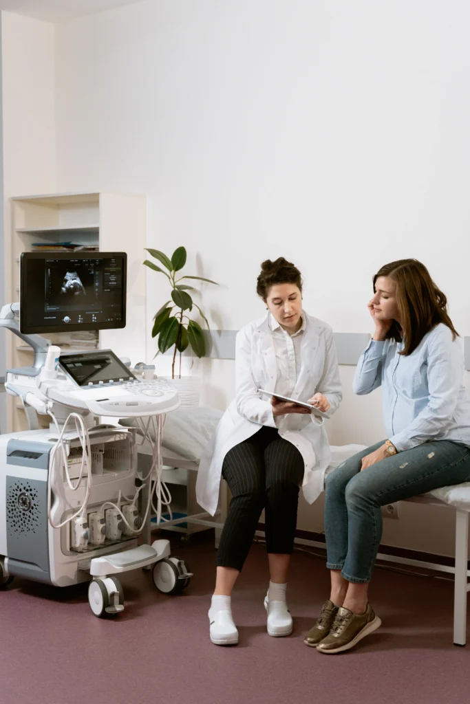 A woman speaking to her doctor