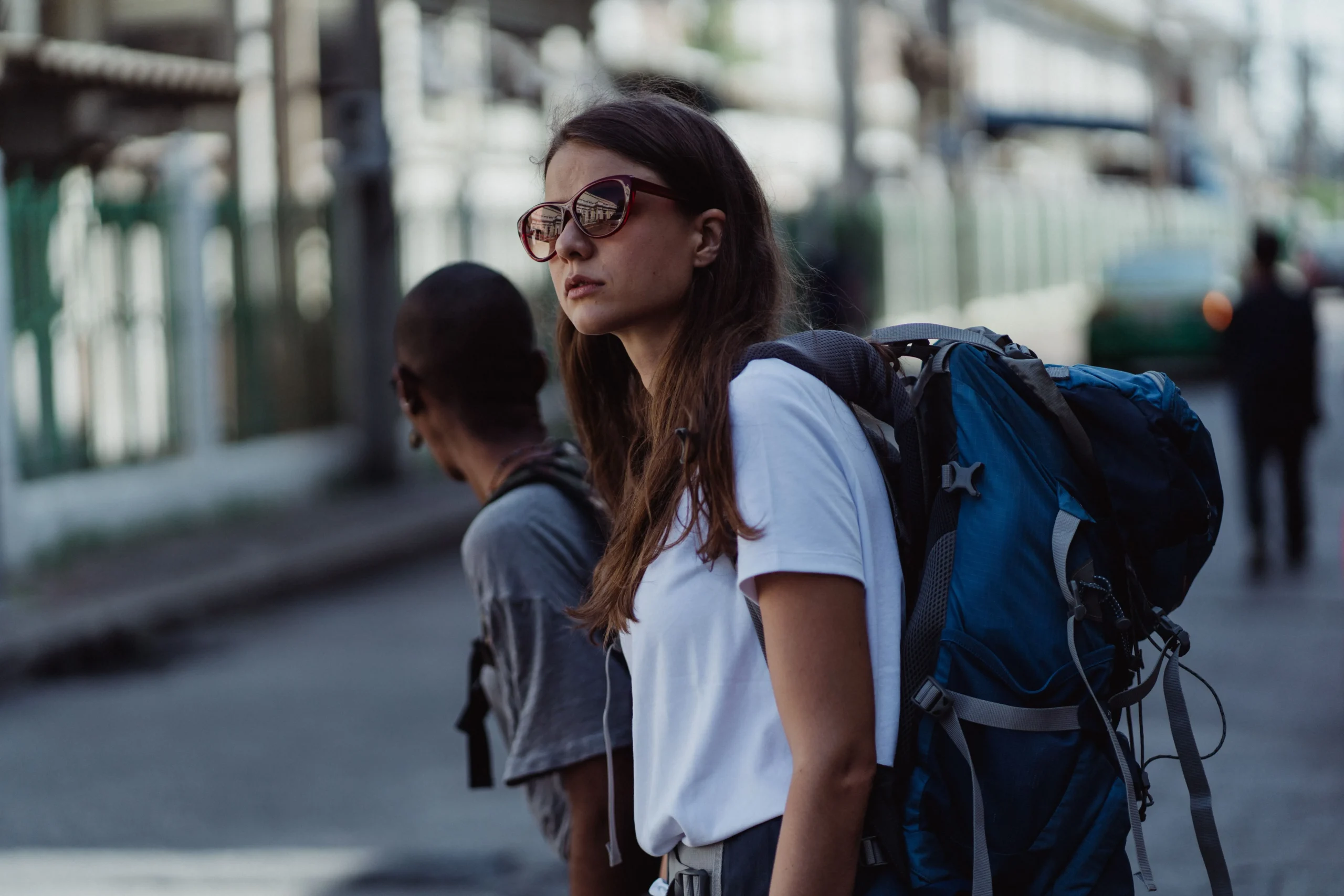 A woman wearing a backpack