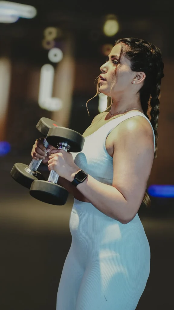 A woman holding weights