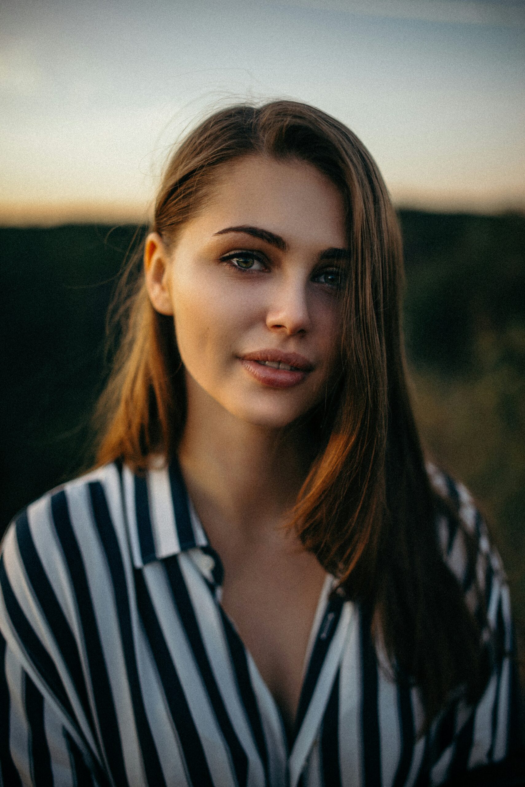 a woman smiling at the camera
