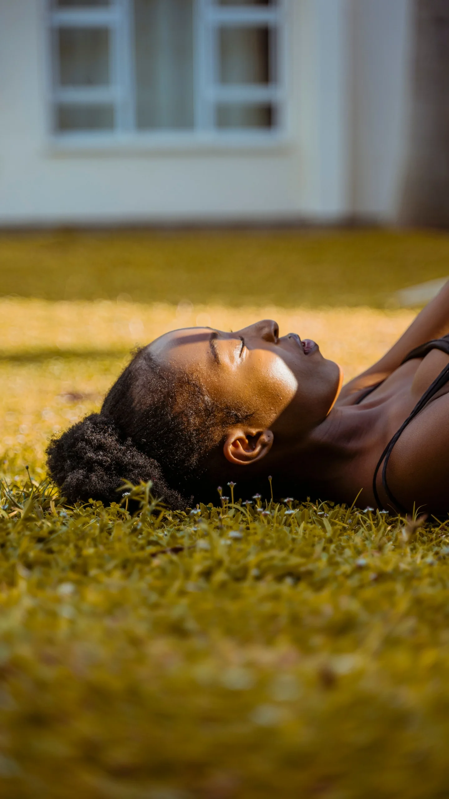 A woman resting outdoors after exercise