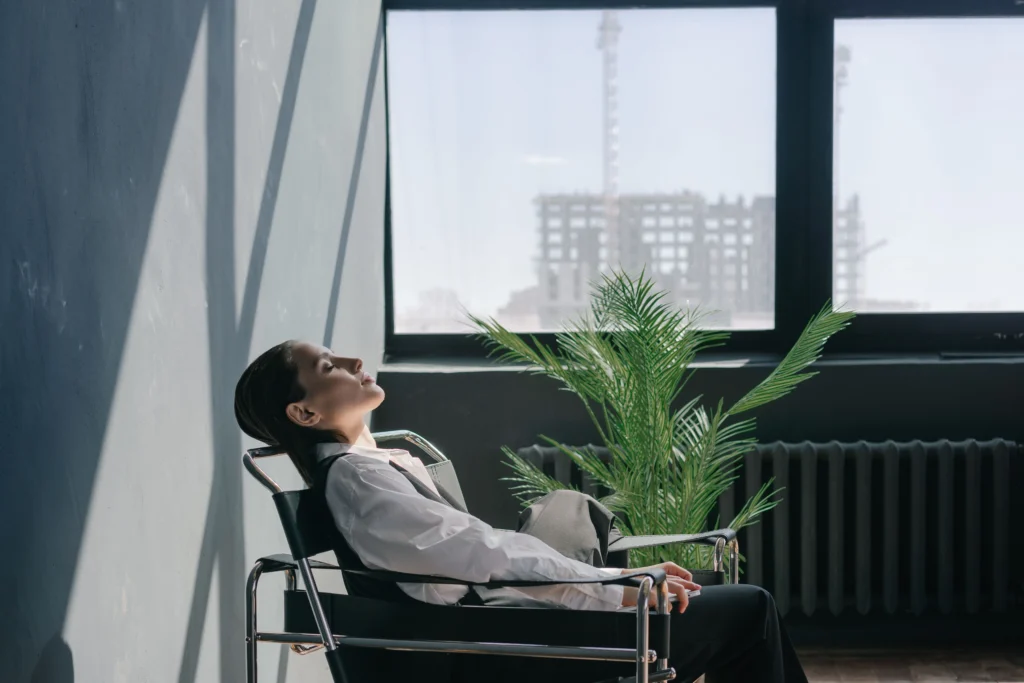 A woman resting sitting in a chair