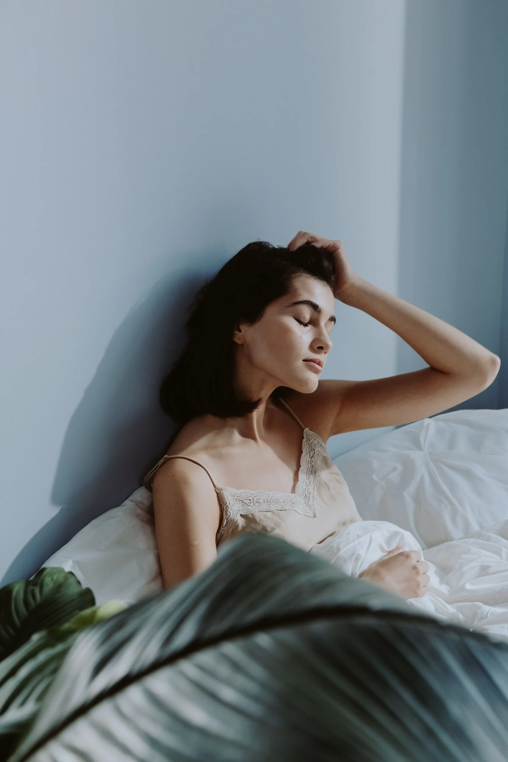 9bc9260e 703c 4a6d a6d4 6ee2d6a73a70webp - Endometriosis Center of Excellence A woman resting in bed