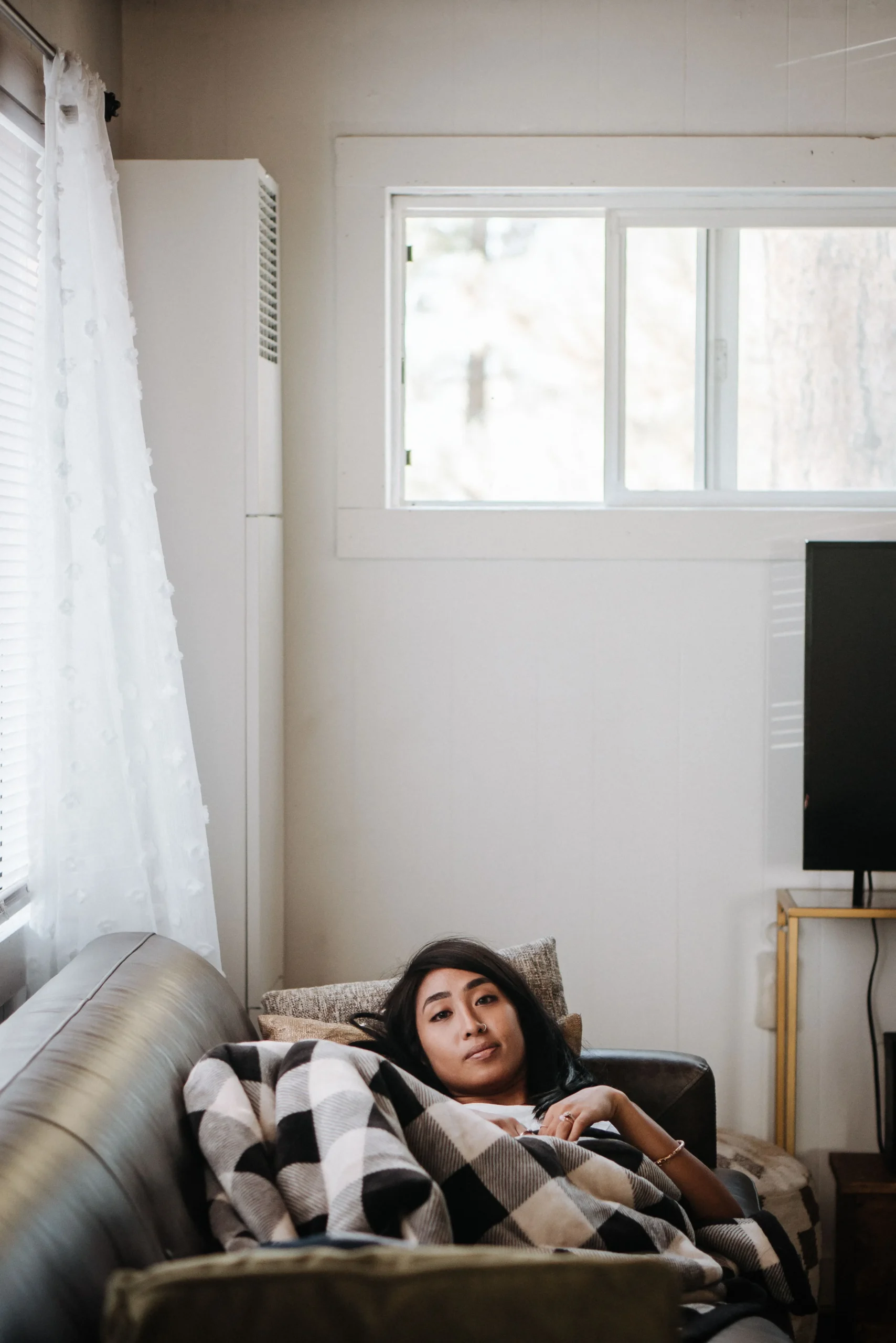 A woman laying down resting